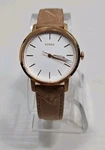 Fossil ES4185 Neely Sand Leather Rose Gold White Dial Watch New Battery Pre-owned. Price: $39.99.