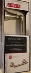 New Delta Woodhurst Pivoting Toilet Paper Holder 73250-SS Brilliance Stainless. Price: $29.95.