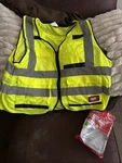 Milwaukee Performance Class 2-HIGH Visibility Safety Vest With 15 Pockets- L/xl New. Price: $13.00.