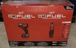 Milwaukee 3890-22 M18/M12 Fuel Impact Wrench & Ratchet Kit, Batteries New. Price: $400.00.