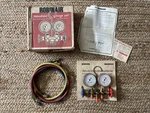 Robinair Manifold Gauge Set Part # 40153 New. Price: $36.00.